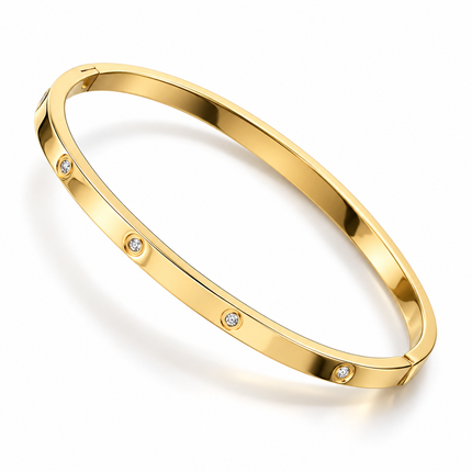 A polished yellow gold bangle bracelet with five small bezel-set clear stones spaced evenly along the band, shown on a clean white background.